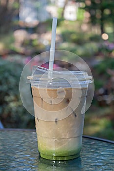 Iced coffee with nature background