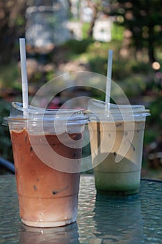 Iced coffee with nature background