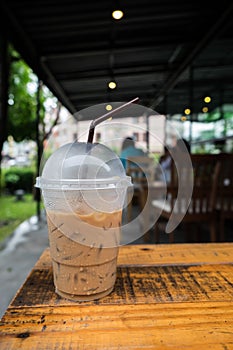 Iced coffee take-home cup. Food background