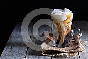 Iced coffee in a tall glass photo