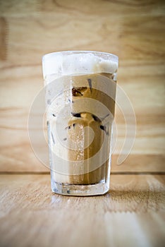 Iced coffee on a wood table
