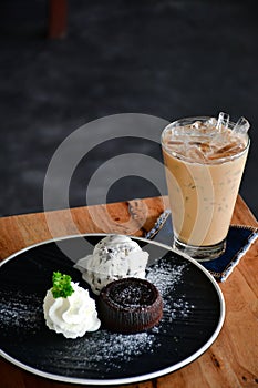 Iced coffee on wooden table