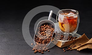 Iced cold brew coffee and freshly roasted coffee beans