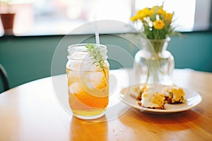 iced herbal tea with a side of fresh scones on a caf table