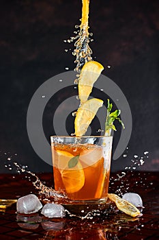 Iced lemon tea in motion concept.