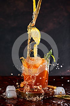 Iced lemon tea in motion concept.