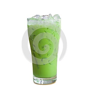 Iced matcha latte or condensed milk-added green tea in transparent glass isolated on white background with clipping path