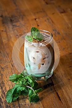 iced mint latte with fresh mint topping
