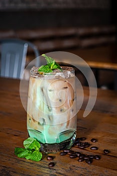 iced mint latte with fresh mint topping