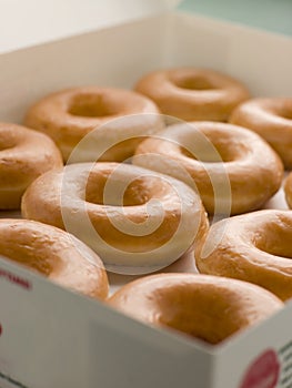 Iced Ring Doughnuts In A Tray