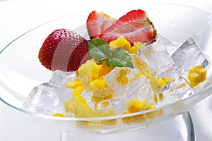 Iced strawberries and mango