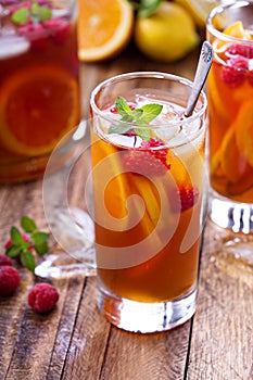 Iced tea with orange and raspberry