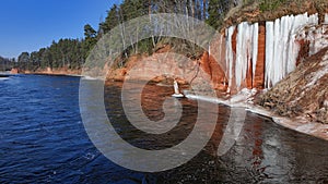 Icefall by the river in spring