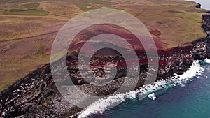 Iceland Epic Aerial Landscape Red Cliffs Striking Blue Ocean Coast Rough Waves Crashing As Hundreds of Birds Fly