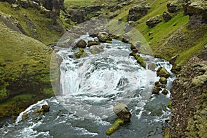 Waterfall Fosstorfufoss over Skogafoss on Iceland,Europe photo