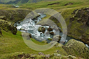 Waterfall Fosstorfufoss over Skogafoss on Iceland,Europe photo