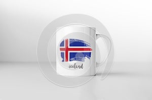 Iceland flag on white coffee mug.