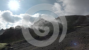 Iceland.Geothermal activity, Hot steam erupts from the ground. Martian landscape.