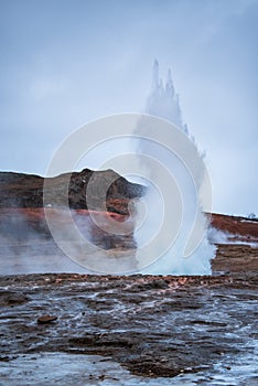 Geothermic Geysir Blowing in Iceland photo