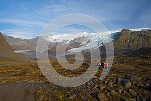 Iceland Glacier Tour a group of people trekking