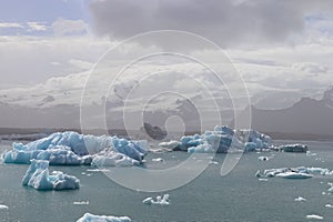 Iceland, Jokulsarlon Lagoon, Turquoise icebergs floating in Glacier Lagoon on Iceland