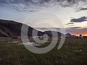 Iceland, Landmannalaugar , July 31, 2019: Beautiful red purple sunrise in Landmannalaugar mountain at camp site area