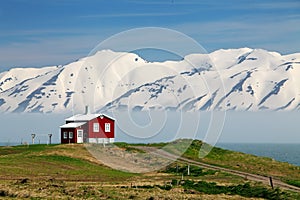 Iceland landscape. Fjord Eyjafjordur, house, mountains