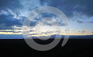 Iceland landscape mountains hills sky clouds sunset