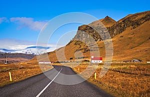 Iceland landscape, road and church with red roof mountain panorama beautiful islandic nature outdoor