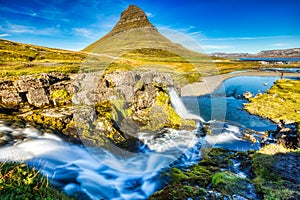 Iceland Landscape Summer Panorama, Kirkjufell Mountain during a Sunny Day with Waterfall in Beautiful Light