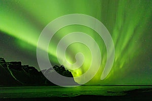 Iceland Northern Lights over Vestrahorn Mountain at Stokksnes peninsula in Southeast Iceland