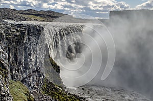 Iceland, powerful Hafragilsfoss waterfall. The power of nature in all its splendor