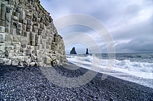 Iceland, Reynisfjara Beach, cliffs and characteristic stretch of sea