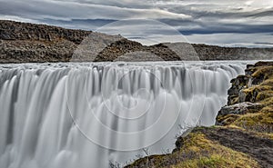 Iceland`s Dettifoss Roaring on a Cloudy Day