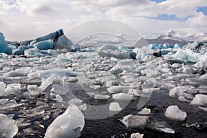 Iceland`s glaciers at the famous Glacier Lagoon. Beautiful cold landscape picture of glacier lagoon bay.