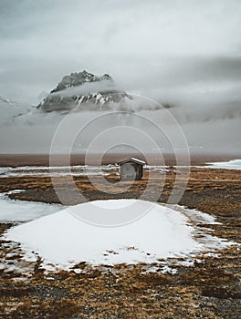 Iceland small capin with Mountain reflection with ice and clouds. Snaesfellnes Peninsula