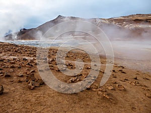 Iceland - Smoking hot pots at the geothermal activie region of Hverir