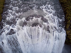 Iceland waterfall Skogafoss in Icelandic nature landscape. Famous tourist attractions and landmarks destination in Icelandic