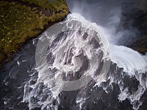 Iceland waterfall Skogafoss in Icelandic nature landscape. Famous tourist attractions and landmarks destination in Icelandic