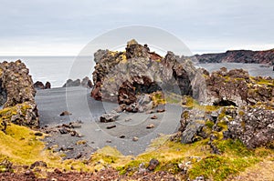 Icelandic beach with black lava rocks, Snaefellsnes peninsula, Iceland photo