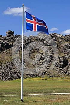 Icelandic Flag at Hot Spring and Laugarhraun Obsidian Lava Stream, Landmannalaugar, Fjallabak Nature Reserve, Central Iceland