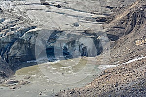 Icelandic glacier tongue with glacier gate and meltwater river