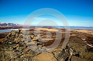 Icelandic landscape with cairn in the foreground