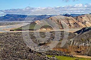 Icelandic mountain landscape. Lava field and volcanic mountains in the Landmannalaugar geotermal area