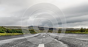 Icelandic street during summer season with spectacular view photo