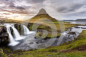 Icelandic waterfall Kirkjufellsfoss at sunset