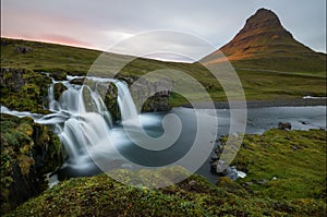 The icelandic waterfall of Kirkjufellsfoss at sunset