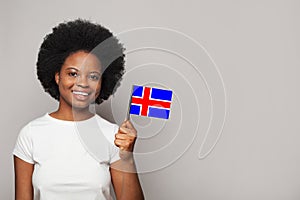 Icelandic woman holding flag of Iceland Education, business, citizenship and patriotism concept