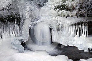 An Icescape with veiled flowing water