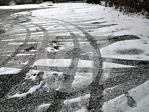 Icey tracks on a road photo